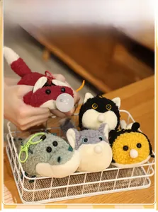Detail view of plush animal stress toys with blow bubble feature in a basket
