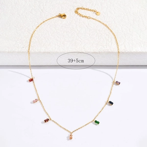 Detail of 39+5cm gold titanium necklace featuring seven colorful cubic zirconia stones