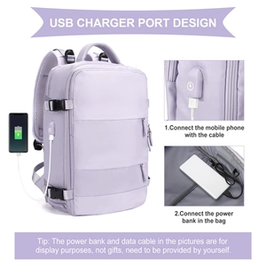 Detail of the light purple travel backpack showing the integrated USB charging port system