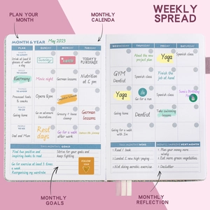 Detailed internal layout showing monthly and weekly planning pages for time management