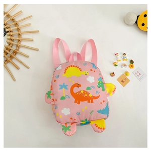 Detailed view of kids' pink backpack featuring colorful cartoon dinosaur patterns and accents