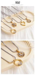 Macro view of copper zircon pendant necklace with mixed silver and gold plating