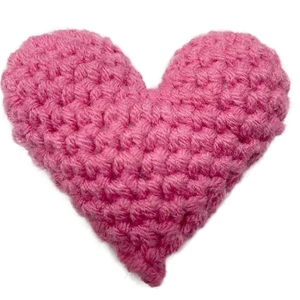 Pink crocheted heart pocket hug made of soft yarn for modern minimalist gift cards