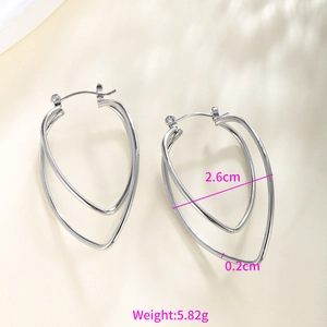 Detail view of double-layer silver teardrop hoop earrings with size and weight specs