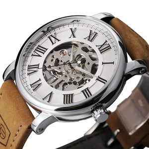 Macro view of mechanical watch skeleton dial with Roman numerals and silver steel case