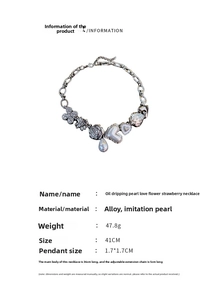 Detail showing various charms like enamel hearts, flowers, and faux pearls on the necklace