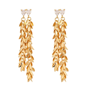 Gold-plated leaf tassel earrings with sparkling heart-shaped cubic zirconia on white background