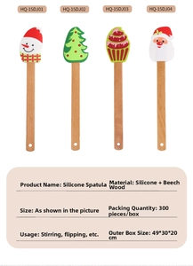 Close-up of four Christmas silicone spatulas with wooden handles featuring festive patterns