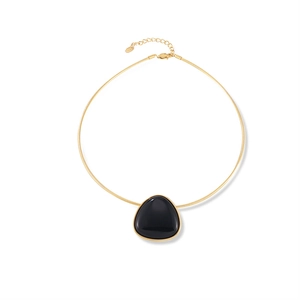 Minimalist gold titanium necklace featuring a triangle black agate pendant on white background
