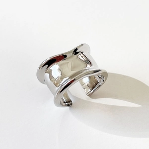 Minimalist 925 sterling silver wide open ring with irregular wavy edges and mirror finish