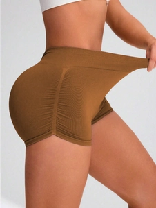 Seamless brown high-waisted yoga shorts with scrunch butt lift and stretch fabric