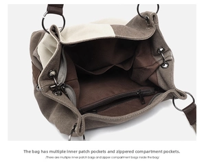Detail showing the inner storage compartment with zipper pocket and open fabric liners