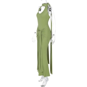 Side view of green halter maxi dress with waist tie and drape detail on a mannequin