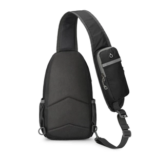 Detail of black nylon chest bag with breathable honeycomb mesh back and strap pocket