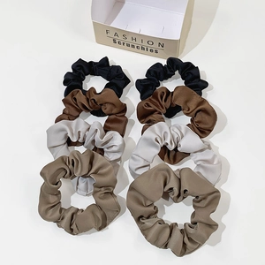 8-piece set of satin silk scrunchies in neutral earth tones with fashion packaging
