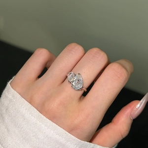 Close-up of Toi et Moi S925 silver ring featuring two pear-cut sparkling cubic zirconia