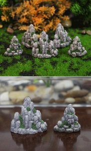 Macro view of miniature rock mountains with green moss texture for terrariums