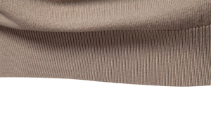 Close-up of the high-density ribbed knit texture and premium fabric of the polo shirt