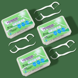 Three boxes of white disposable dental floss picks with high-strength polymer round thread