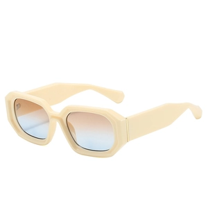 Chic beige hexagonal geometric sunglasses with brown to blue gradient lenses on white