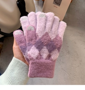 Detail of purple and pink diamond knit gloves with touchscreen-friendly fingertips