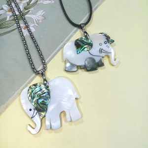Handmade elephant shell pendant with abalone shell inlay on metal chain and leather cord