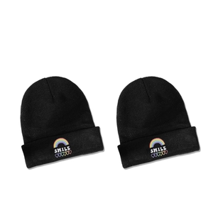 Two black knitted beanies with colorful rainbow and SMILE embroidery for winter warmth