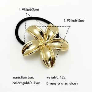 Detail of 5cm gold flower metal charm on high elasticity black hairband with 12g weight