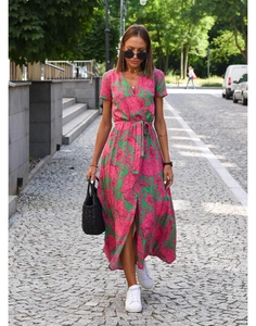 Detail of floral V-neck maxi dress with pink and green botanical print and waist tie