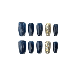 Aurora blue cat-eye coffin press-on nails with champagne diamonds and gold glitter