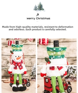 Detailed view of a plush snowman wine bottle cover with long legs and striped scarf