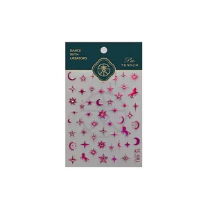 Embossed 5D Christmas nail art stickers with moon and star patterns in rose gold finish