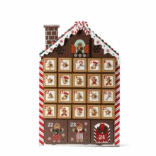 Detailed view of wooden gingerbread house advent calendar with 24 numbered drawers