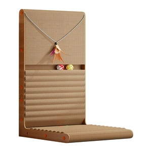 L-shaped vertical cardboard cat scratcher with built-in toy bells and feather wand
