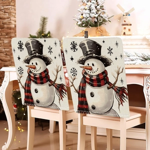 Christmas snowman chair covers with red plaid scarves and holiday tree background