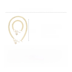 Detail view of gold alloy necklace set with crystal lock pendants and specifications