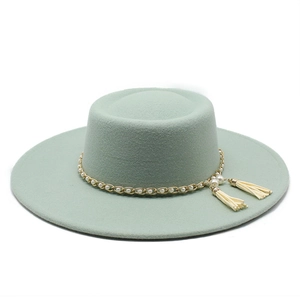 Elegant mint green wool boater hat with pearl gold chain and stylish side tassels