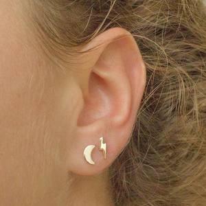 S925 silver needle moon and lightning gold stud earrings on female model ear