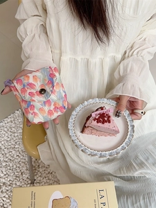 Mini floral storage pouch for sanitary pads with tulip pattern and purple lanyard strap