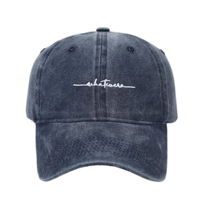 Vintage washed navy baseball cap with white 'whatever' embroidery and curved brim