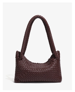 Close-up of dark brown woven leather texture and unique knotted handle on hobo bag