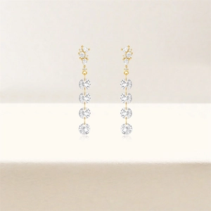 Detail of luxury S925 silver long tassel earrings with sparkling cubic zirconia gems
