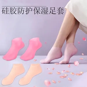 Moisturizing silicone foot protection socks in pink and beige for skin hydration