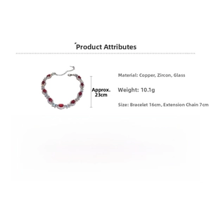 Detailed view of silver chain bracelet with red oval gemstone and white cubic zirconia