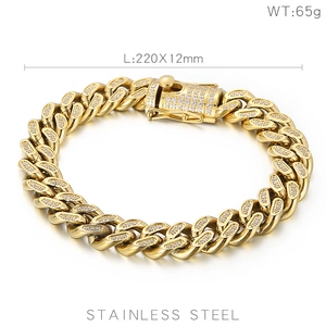 Detail view of 12mm gold stainless steel Cuban link bracelet with CNC set diamonds