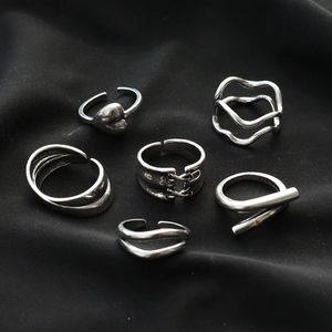 Set of six minimalist silver adjustable rings with heart and wavy designs for women
