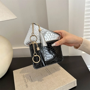 Chic faux crocodile texture coin purses in silver and black with gold zipper and tassels