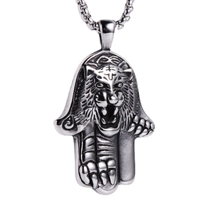 Pendentif vintage en acier inoxydable avec tête de tigre et main de Fatma argentée