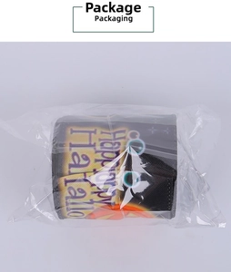 Detail of Happy Halloween spider print ribbon roll in transparent poly bag packaging
