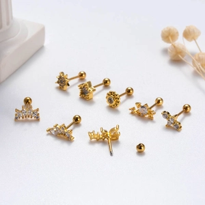 Set of 8 gold stainless steel ear piercings with zircon stars and butterfly designs